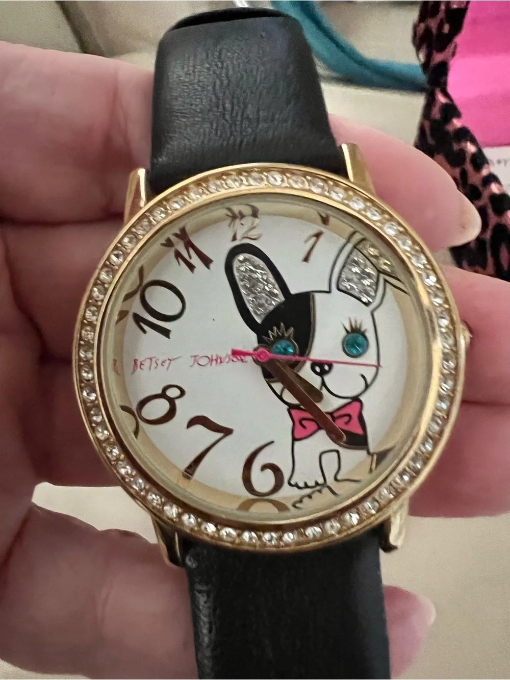 Betsey Johnson Gold Watch with Black Strap and Pink Bow Dial
